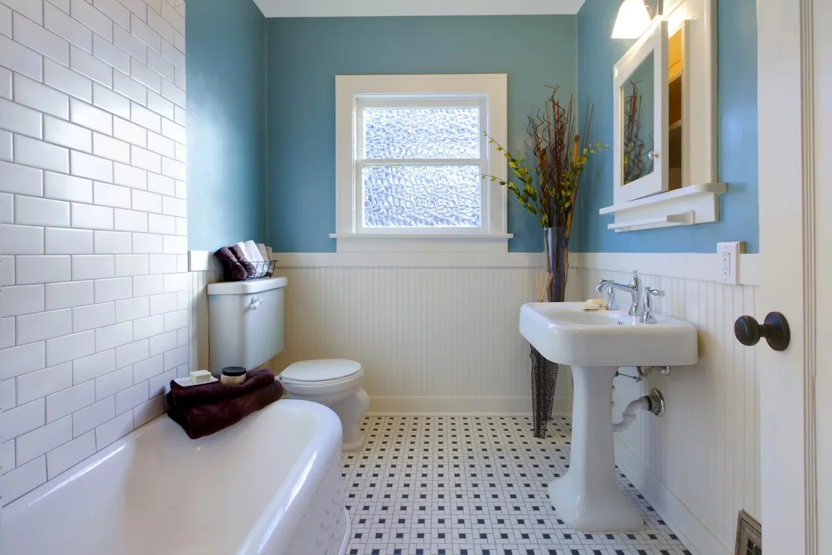 Traditional full bathroom renovation with clawfoot tub and subway tile